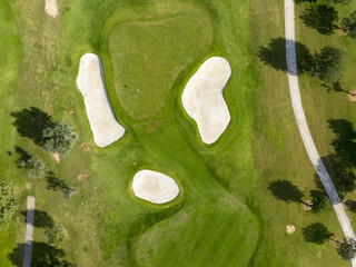 Aerial view, Spain, Balearic Islands, Mallorca, Capdepera, Cuevas de Arta and Platja de Canyamel with golf course, sand bunker, green, golfer