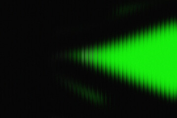 Abstract lime green light beam with vertical linear texture and soft glow. Digital green light leak with vertical scanning lines on a grainy black background