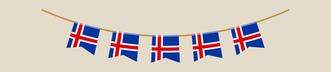 Obraz premium Icelandic flag bunting garland hanging on a string for a national holiday or festival event as a patriotic decoration.