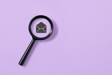 envelope illustration with magnifying glass