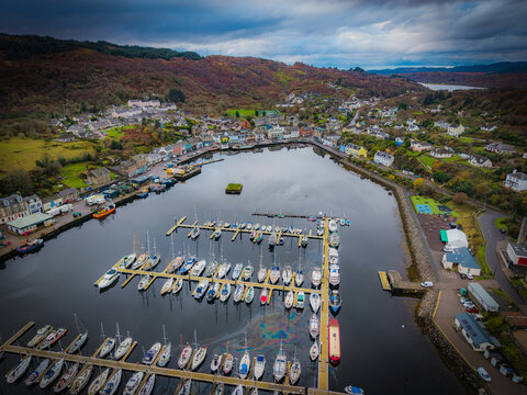 an aerial view of the picturesque Tarbert Harbour in the village of Tarbert, Loch Fyne, Argyll, Scotland