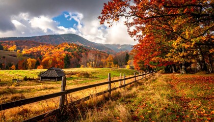Naklejka premium Autumn Landscape with Colorful Trees and Mountains in the Background.