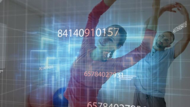 Pair performing side stretch in gym, movement sparking blue grid overlay receding for fitness