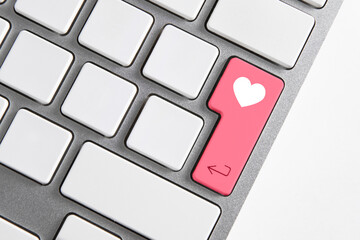 keyboard with pink like button
