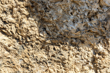 background, texture of stone mineralogical rocks in nature on a sunny day in a mountainous area,...