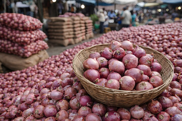A vibrant display of red onions at a bustling market
