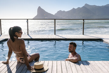 Relaxing moments by the pool in stunning Cape Town, South Africa with a beautiful mountain view © Fokke Baarssen