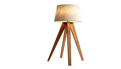 Modern wooden tripod floor lamp with a neutral shade glowing against a black background