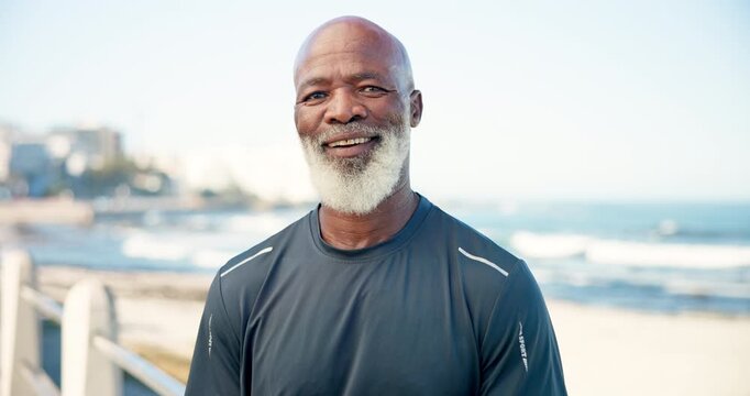 Senior black man, face and runner at beach, promenade and break for exercise, pride and outdoor in summer. African person, happy and portrait by ocean, boardwalk and space with fitness in Nigeria