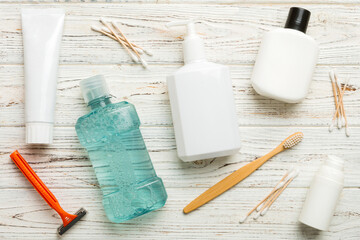 Mockup for bathing products top view flat lay, spa razor, toothpaste, soap, gel and other various...