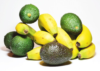 Avocado and banana, tropical fruits, in front shot and white background.	