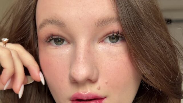 Happy smiling fashion model close up. Elegant female with perfect skin and pink glossy lips. Bright positive emotional lady. Fun Joyful Caucasian Woman. Skincare cosmetology beauty concept background