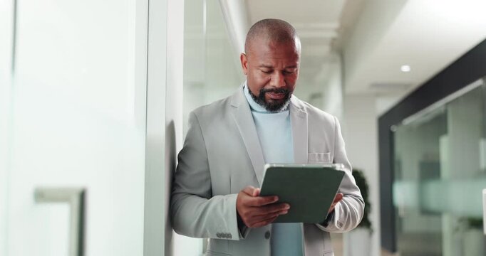 Mature businessman, tablet and smile at office, scroll and notification for real estate deal. African person, realtor and property developer with tech, application and reading proposal in corridor