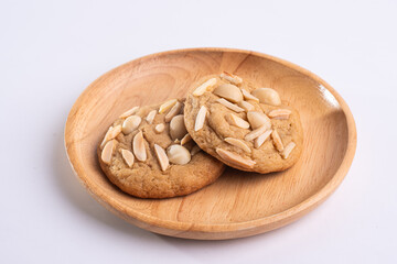 soft cookies with almond macadamia and chocolate on a table and plate