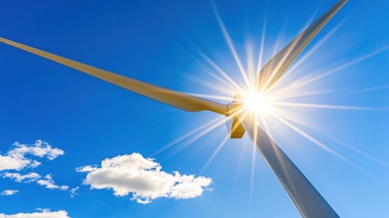 Close-up of a single wind turbine blade rotating against a bright afternoon sky