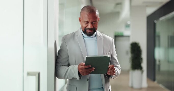 Mature man, tablet and happy with scroll at office, notification or deal for real estate project. African person, realtor and property developer with tech, app and smile with proposal in corridor