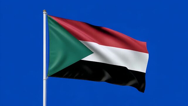 Dynamic Sudanese flag waving proudly against a plain blue screen background, symbolizing national pride and identity with vibrant colors and motion