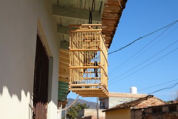 Decorative wooden singing bird cage in Trinidad, Cuba.
