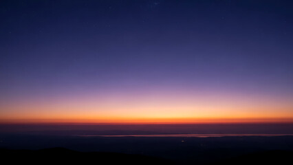 Serene Sunset Landscape Over Ocean Vista - Tranquil Nature View at Dusk