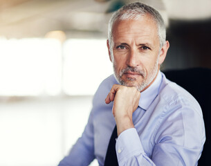 Naklejka premium Office, confidence and portrait of mature businessman with pride, about us and serious director at law firm. Legal consultant, lawyer or man at desk with trust, support and leader with mockup space