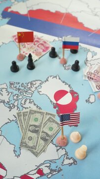 World powers like the USA, China, Russia, and the EU competing for influence and resources in Greenland, represented by flags, money, and chess pieces on a map in a conceptual geopolitical game