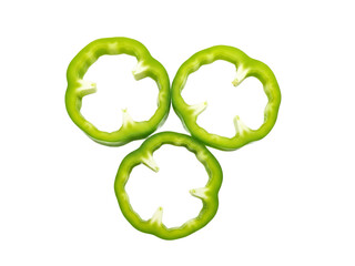 Three bright green bell pepper slices arranged in a triangular formation on white green pepper slices