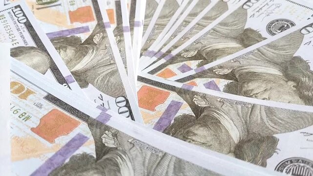 Close-Up of Scattered 100-dollar Bills. Economic Concept