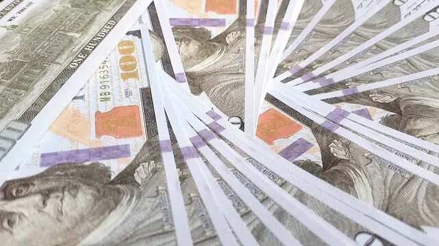 Close-Up of Scattered 100-dollar Bills. Economic Concept