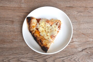 piece of baking homemade cheese pizza dressing tomato sauce on plate 