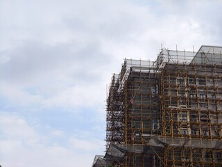 Building full of scaffolding © Zibo Dai