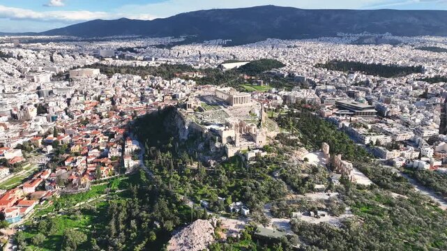 Flying around the Acropolis of Athens, Greece on a sunny day