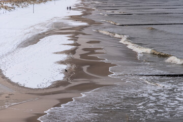 Winter walkers on the Baltic Sea coast of Usedom 