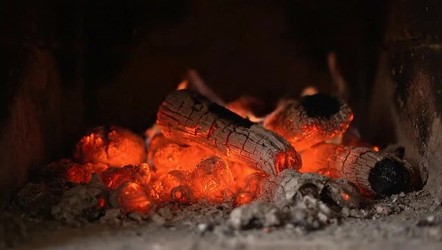 Cozy Fireplace Ambiance - Burning Logs and Glowing Embers.