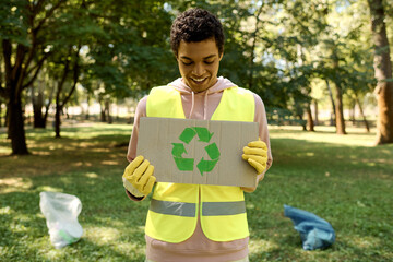 Enthusiastic young activist engages in eco friendly park cleanup initiative