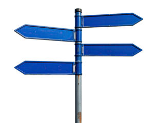 Blue signs point directions on metal pole