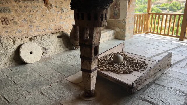An old lifting mechanism in the monasteries of Meteora in Greece. detailed video - how the mechanism for lifting weights on the rock was arranged like an elevator. Close-up, 2025