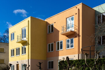 Naklejka premium Colorful Functionalist Residential Architecture in Oslo with Yellow and Peach Facades