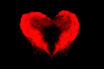 red powder explosion isolated on black background