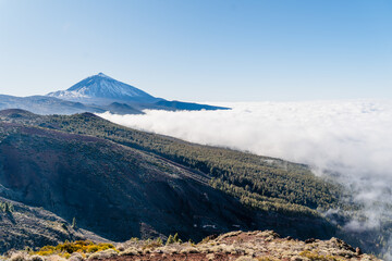 Wild Valley in El Teide National Park, Canary Islands, Tenerife, Spain. Snowcapped Teide volcano.