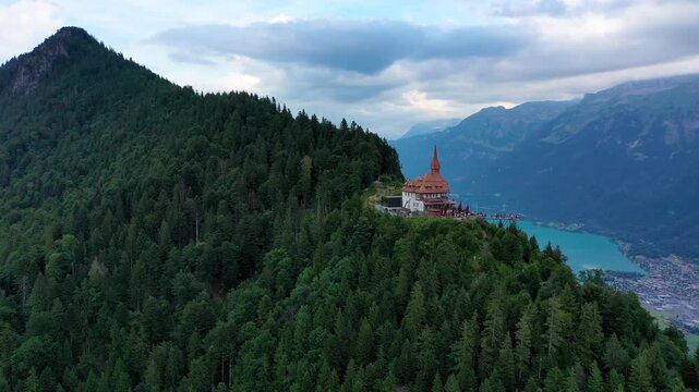 Beautiful top of Harder Kulm in Swiss Interlaken in summer sunset. Turquoise Lake Thun and Brienz in background. Stunning scenery on top of Harder Kulm over Interlaken. Berner Oberland, Switzerland