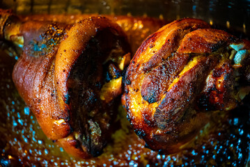 Roasted pork knuckle with crispy golden skin.