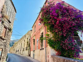 Fototapete Rund Enge Straßen narrow street in the old town  © Piyota