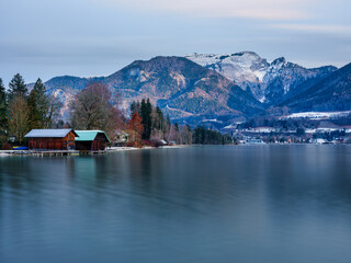 Fototapeta premium Long Exposure of Boathouses and St Wolfgang Village in Winter