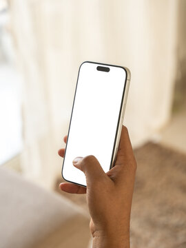 Real mobile phone on hand mockup. Isolated cellphone template. 