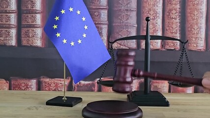 European Union laws and justice system explained through gavel and flag representation