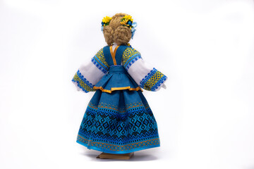 The Ukrainian motanka doll is an ancient amulet and symbol of Ukrainian culture, made without a face so as not to instill a soul in it. Instead of a face, a cross is often dangled to protect against e