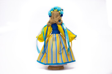 The Ukrainian motanka doll is an ancient amulet and symbol of Ukrainian culture, made without a face so as not to instill a soul in it. Instead of a face, a cross is often dangled to protect against e