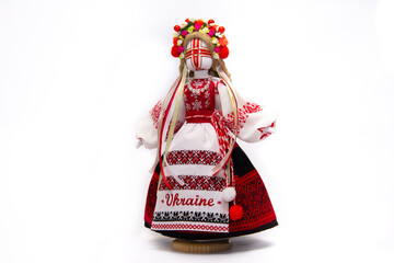 The Ukrainian motanka doll is an ancient amulet and symbol of Ukrainian culture, made without a face so as not to instill a soul in it. Instead of a face, a cross is often dangled to protect against e