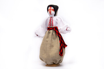 The Ukrainian motanka doll is an ancient amulet and symbol of Ukrainian culture, made without a face so as not to instill a soul in it. Instead of a face, a cross is often dangled to protect against e