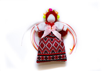 The Ukrainian motanka doll is an ancient amulet and symbol of Ukrainian culture, made without a face so as not to instill a soul in it. Instead of a face, a cross is often dangled to protect against e